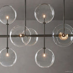 Lucelle Glass Globe Linear Chandelier 58"