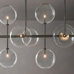Lucelle Glass Globe Linear Chandelier 58"